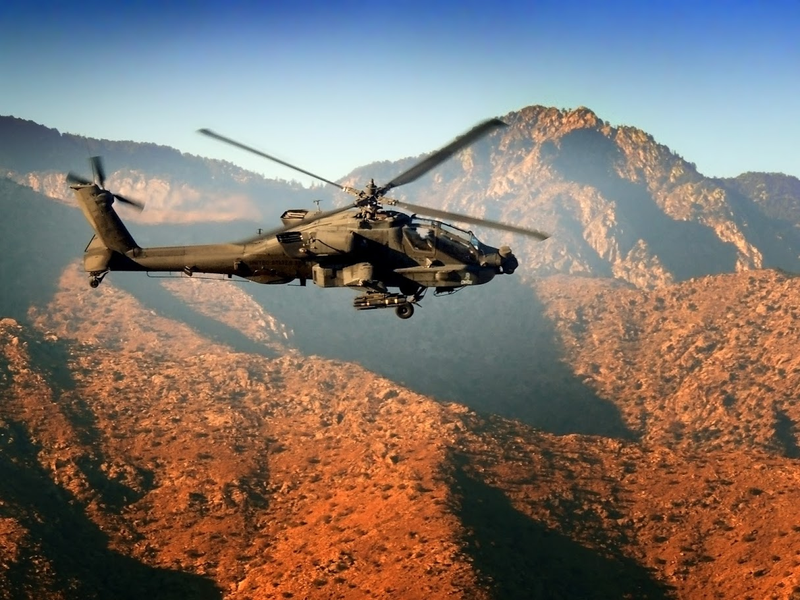 Illustration for article titled One Of Our Readers Is Flying Apaches In Afghanistan And Really Knows How To Use A Camera